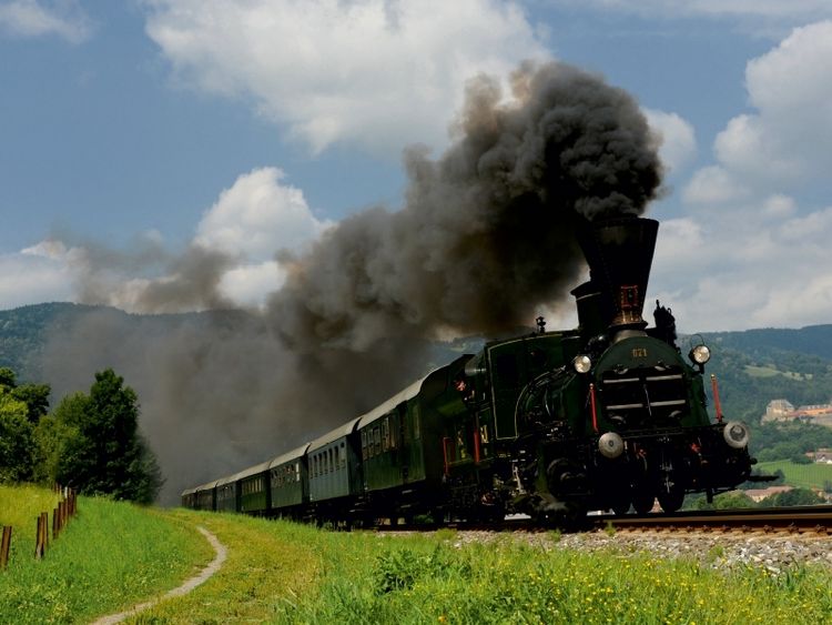Produktbild: CALVENDO Puzzle Unterwegs mit der dienst&auml;ltesten Dampflokomotive der Welt. | 1000 Teile Lege-Gr&ouml;&szlig;e 64x48cm Foto-Puzzle f&uuml;r gl&uuml;ckliche Stunden