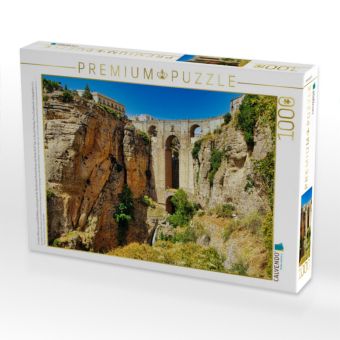 Produktbild: CALVENDO Puzzle In einer H&ouml;he von rund 120 Metern &uuml;berspannt die Steinbr&uuml;cke Puente Nuevo die Schlucht El Tajo, in die sich Rondas Fluss Guadalev&iacute;n re