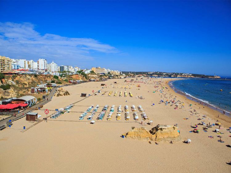 Produktbild: CALVENDO Puzzle Der Strand von Portimao an der Algarve | 1000 Teile Lege-Gr&ouml;&szlig;e 64x48cm Foto-Puzzle f&uuml;r gl&uuml;ckliche Stunden