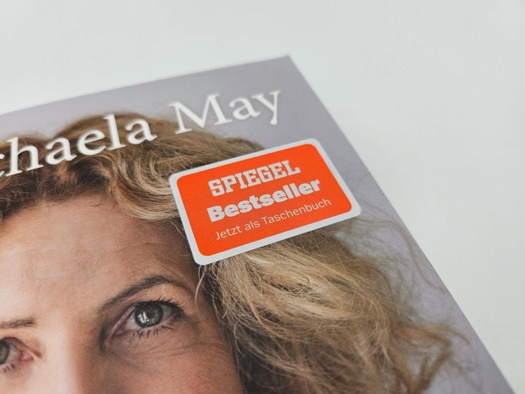 Produktbild: Hinter dem L&auml;cheln