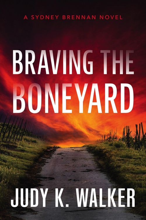 Produktbild: Braving the Boneyard: A Sydney Brennan Novel (Sydney Brennan PI Mysteries, #5)