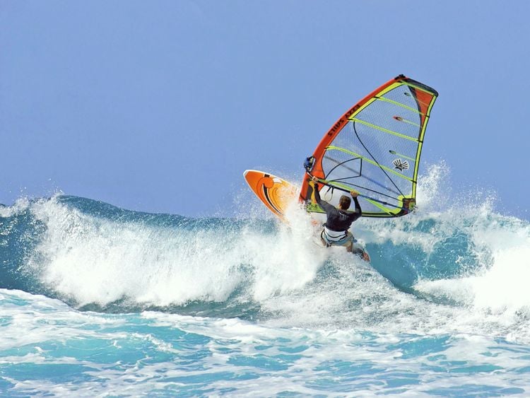 Produktbild: CALVENDO Puzzle Beherzter Windsurfer gleitet rasant durch die Brandung. | 1000 Teile Lege-Gr&ouml;&szlig;e 64x48cm Foto-Puzzle f&uuml;r gl&uuml;ckliche Stunden