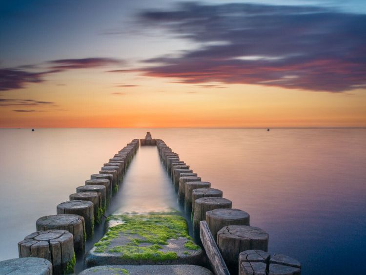 Produktbild: CALVENDO Puzzle Buhnen beim Sonnenuntergang &uuml;ber der Ostsee | 1000 Teile Lege-Gr&ouml;&szlig;e 64x48cm Foto-Puzzle f&uuml;r gl&uuml;ckliche Stunden