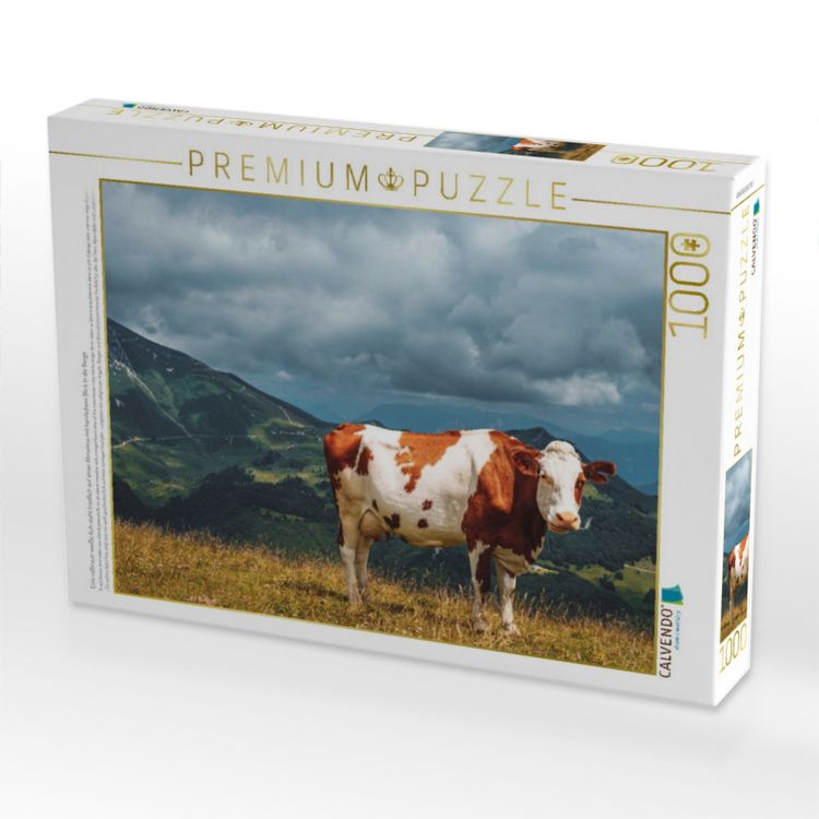 Produktbild: CALVENDO Puzzle Eine rotbraun-wei&szlig;e Kuh steht friedlich auf einer Almwiese mit herrlichem Blick in die Berge | 1000 Teile Lege-Gr&ouml;&szlig;e 64x48cm Foto-Puzz