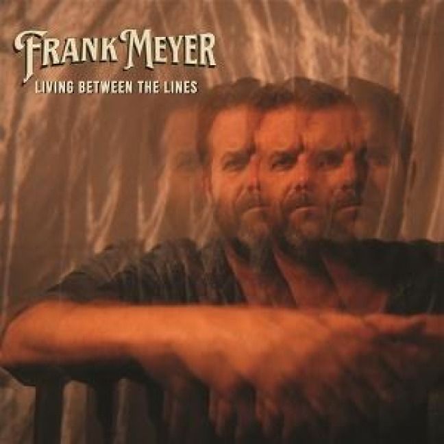 Produktbild: Living Between The Lines