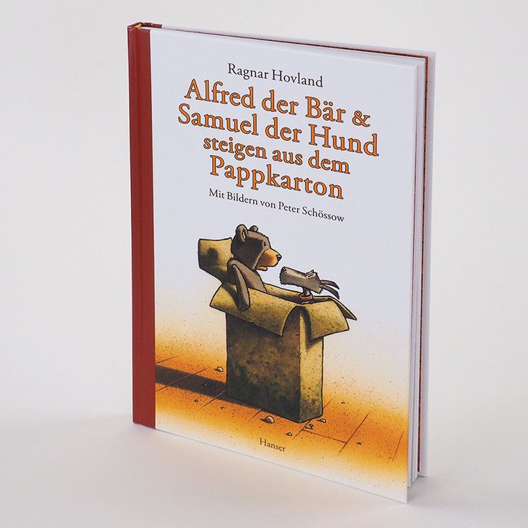 Produktbild: Alfred der B&auml;r und Samuel der Hund steigen aus dem Pappkarton