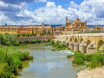 Produktbild: CALVENDO Puzzle Die R&ouml;mische Br&uuml;cke &uuml;ber den Guadalquivir | 1000 Teile Lege-Gr&ouml;&szlig;e 64x48cm Foto-Puzzle f&uuml;r gl&uuml;ckliche Stunden