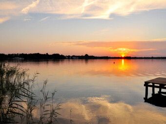 Produktbild: CALVENDO Puzzle Sonnenuntergang mit gespiegelten Wolken am Zwischenahner Meer | 1000 Teile Lege-Gr&ouml;&szlig;e 64x48cm Foto-Puzzle f&uuml;r gl&uuml;ckliche Stunden