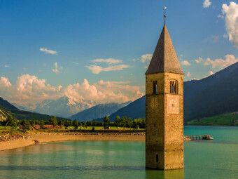 Produktbild: CALVENDO Puzzle Ein Motiv aus dem Kalender Rund um den Reschenpass / CH-Version | 1000 Teile Lege-Gr&ouml;&szlig;e 64x48cm Foto-Puzzle f&uuml;r gl&uuml;ckliche Stunden