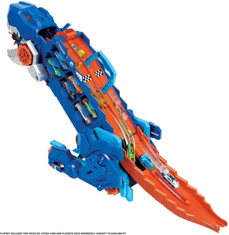 Produktbild: Der Hot Wheels City Ultimative Transporter verwandelt sich in einen T-Rex mit Rennstrecke, Aufbewahrung von mehr als 20 Autos