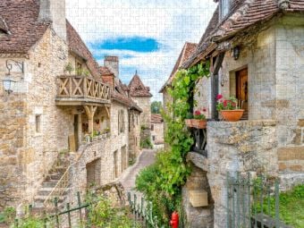 Produktbild: CALVENDO Puzzle Carennac mit alten Gassen und Zinnen auf den Wehrmauern mit stadttor&auml;hnlichem Bogendurchlass zum Abteigeb&auml;ude | 1000 Teile Lege-Gr&ouml;&szlig;e 64x48cm Foto-Puzzle f&uuml;r gl&uuml;ckliche Stunden