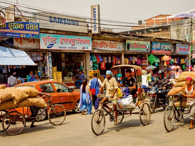 Produktbild: CALVENDO Puzzle Fahrradrikschas in den Stra&szlig;en von Pokhara | 1000 Teile Lege-Gr&ouml;&szlig;e 64x48cm Foto-Puzzle f&uuml;r gl&uuml;ckliche Stunden