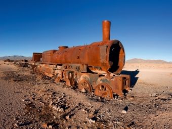 Produktbild: CALVENDO Puzzle Eisenbahnfriedhof bei Uyuni, 3.650 m &uuml;. N., Bolivien | 1000 Teile Lege-Gr&ouml;&szlig;e 64x48cm Foto-Puzzle f&uuml;r gl&uuml;ckliche Stunden