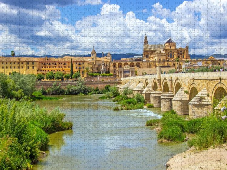 Produktbild: CALVENDO Puzzle Die R&ouml;mische Br&uuml;cke &uuml;ber den Guadalquivir | 1000 Teile Lege-Gr&ouml;&szlig;e 64x48cm Foto-Puzzle f&uuml;r gl&uuml;ckliche Stunden