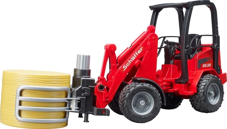 Produktbild: bruder 02192 Sch&auml;ffer Hoflader 2630 mit Ballengreifzange + Rundballen