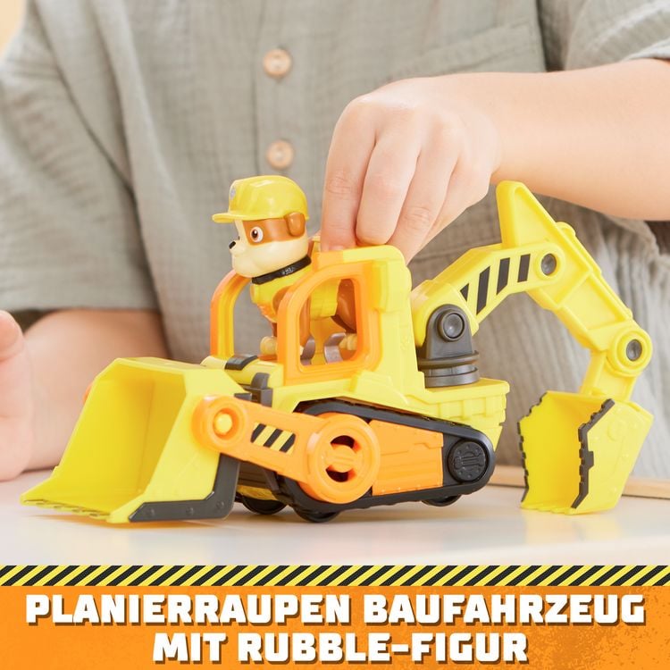 Produktbild: Rubble und Crew - Planierraupen-Baufahrzeug mit Rubble-Figur, bewegliche Schaufel & Bagger, Spielzeug aus der TV-Serie, ab 3 Jahren