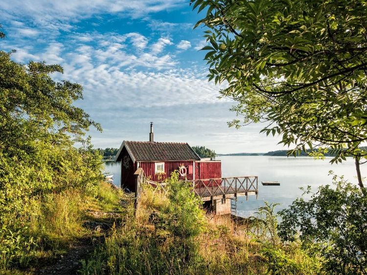 Produktbild: CALVENDO Puzzle Eine Holzh&uuml;tte an der K&uuml;ste | 1000 Teile Lege-Gr&ouml;&szlig;e 64x48cm Foto-Puzzle f&uuml;r gl&uuml;ckliche Stunden