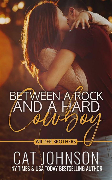 Produktbild: Between a Rock and a Hard Cowboy (Wilder Brothers, #3)