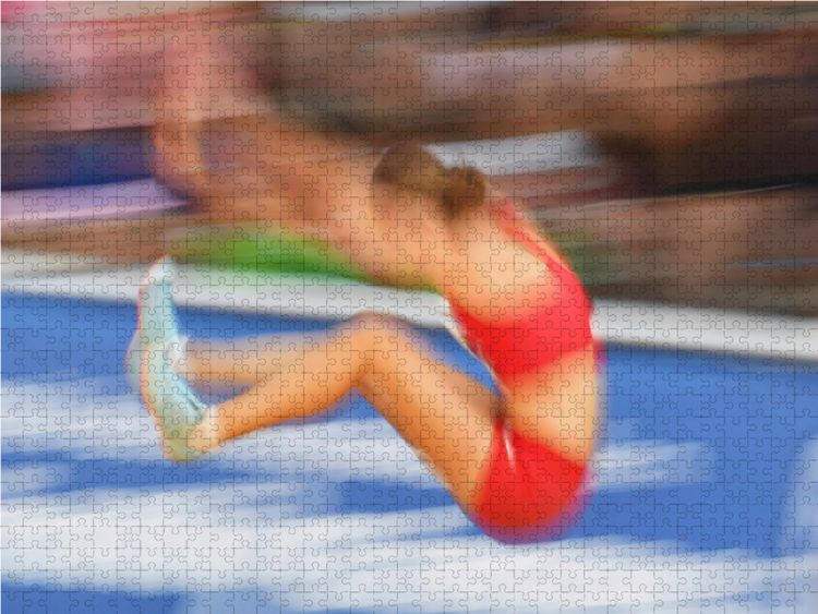 Produktbild: CALVENDO Puzzle Leichtathletik Wettkampf: Momentaufnahme aus dem Weitsprung | 1000 Teile Lege-Gr&ouml;&szlig;e 64x48cm Foto-Puzzle f&uuml;r gl&uuml;ckliche Stunden