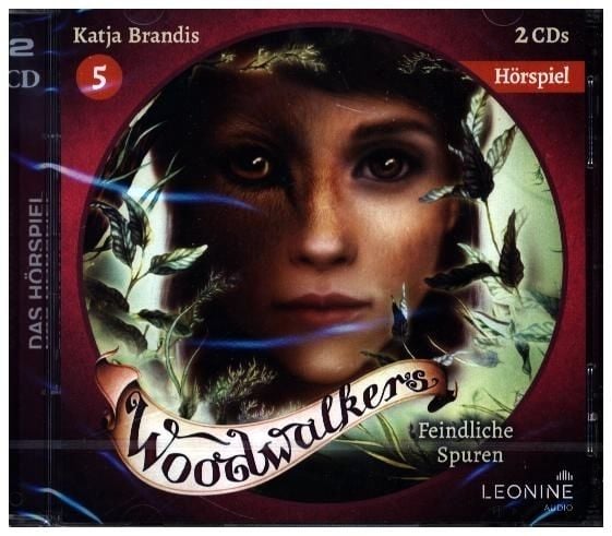 Produktbild: Woodwalkers - Feindliche Spuren (H&ouml;rspiel zu Band 5)