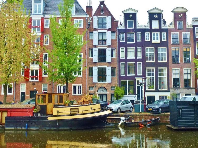 Produktbild: CALVENDO Puzzle Amsterdam - Gracht mit Hausboot | 1000 Teile Lege-Gr&ouml;&szlig;e 64x48cm Foto-Puzzle f&uuml;r gl&uuml;ckliche Stunden