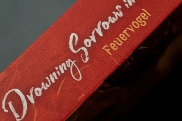 Produktbild: Drowning Sorrows in Raging Fire 1