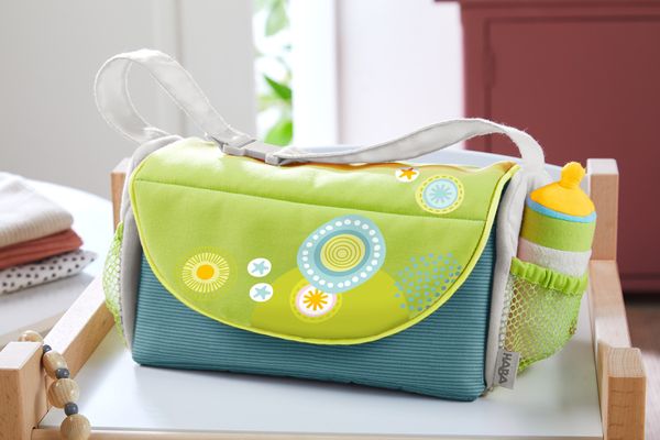 HABA 306516 - Puppen-Wicktasche Sommerwiese, Stoff, 4-teilig