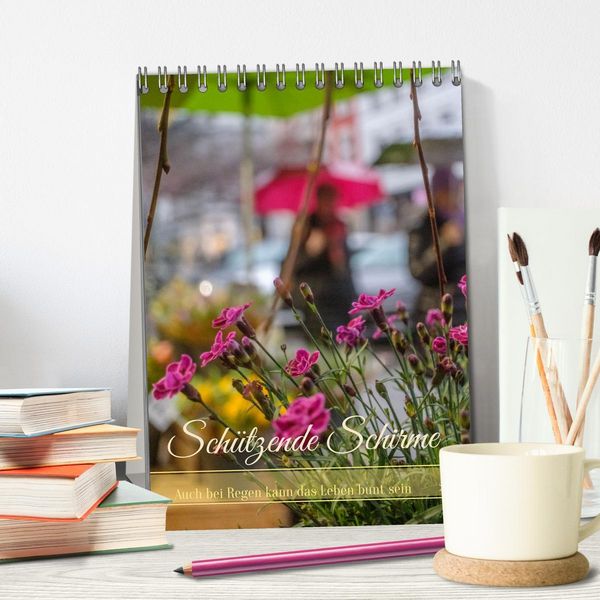 Produktbild: Sch&uuml;tzende Schirme - Auch bei Regen kann das Leben bunt sein (Tischkalender 2026 DIN A5 hoch), CALVENDO Monatskalender