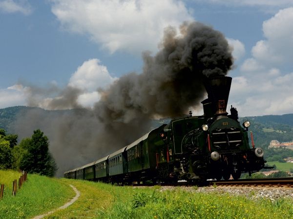 Produktbild: CALVENDO Puzzle Unterwegs mit der dienst&auml;ltesten Dampflokomotive der Welt. | 1000 Teile Lege-Gr&ouml;&szlig;e 64x48cm Foto-Puzzle f&uuml;r gl&uuml;ckliche Stunden