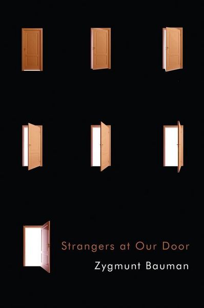 Produktbild: Strangers at Our Door
