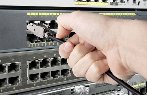 Produktbild: Renkforce RF-4538220 RJ45 Patchkabel CAT 6a S/FTP 20.00 m Schwarz mit Zugring zur Entriegelung 1 St.