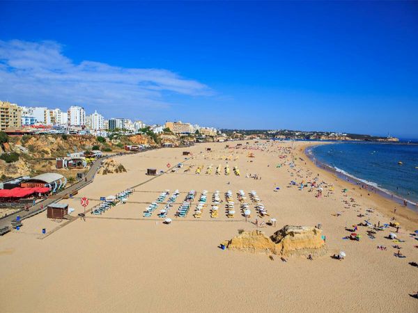 Produktbild: CALVENDO Puzzle Der Strand von Portimao an der Algarve | 1000 Teile Lege-Gr&ouml;&szlig;e 64x48cm Foto-Puzzle f&uuml;r gl&uuml;ckliche Stunden