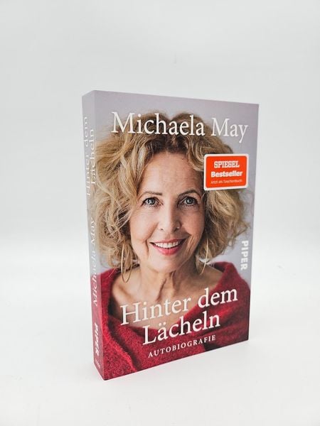 Produktbild: Hinter dem L&auml;cheln