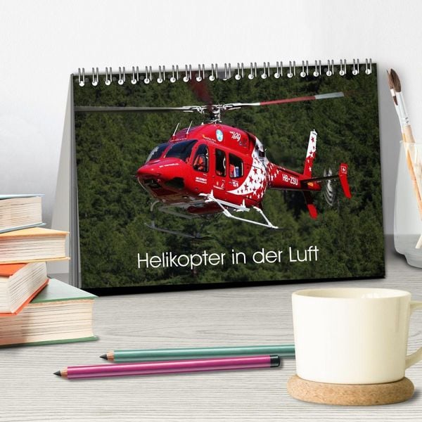 Produktbild: Helikopter in der Luft (Tischkalender 2027 DIN A5 quer), CALVENDO Monatskalender