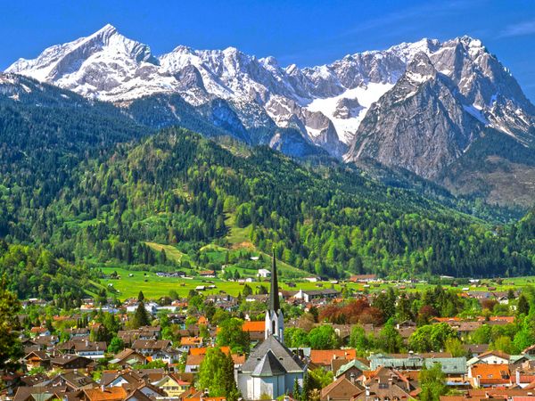 Produktbild: CALVENDO Puzzle Blick auf Partenkirchen mit Pfarrkirche Maria-Himmelfahrt und Wettersteingebirge | 1000 Teile Lege-Gr&ouml;&szlig;e 64x48cm Foto-Puzzle f&uuml;r gl&uuml;ck