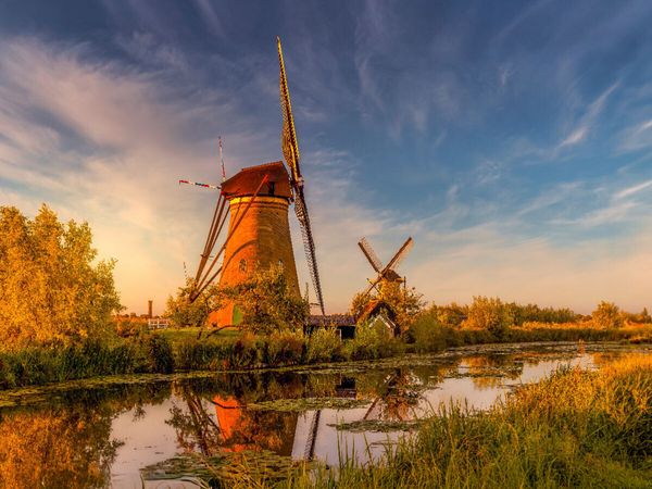 Produktbild: CALVENDO Puzzle Windm&uuml;hlen von Kinderdijk in der Abendd&auml;mmerung | 1000 Teile Lege-Gr&ouml;&szlig;e 64x48cm Foto-Puzzle f&uuml;r gl&uuml;ckliche Stunden