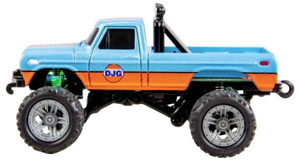 Produktbild: Amewi Orange Brushed 1:64 RC Modellauto Elektro Monstertruck Heckantrieb (2WD) RtR 2,4 GHz mit Lichteffekt, inkl. Akku und Ladekabel