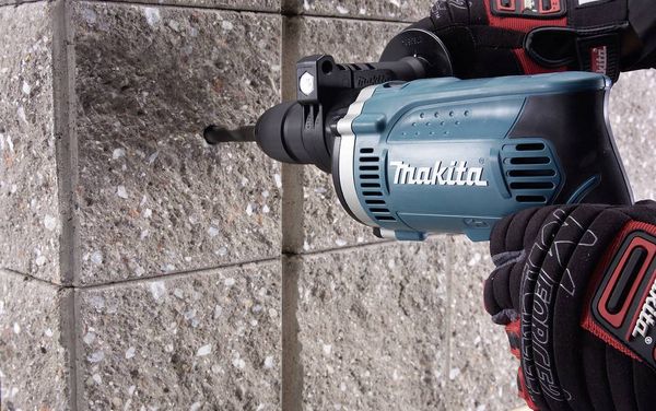 Produktbild: Makita HP1631KX3 1-Gang-Schlagbohrmaschine 710W mit Zubeh&ouml;r, inkl. Koffer