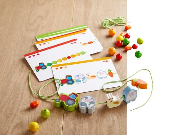 Produktbild: HABA 2014447001 - F&auml;delspiel Bauernhof-Freunde, 29-teilig