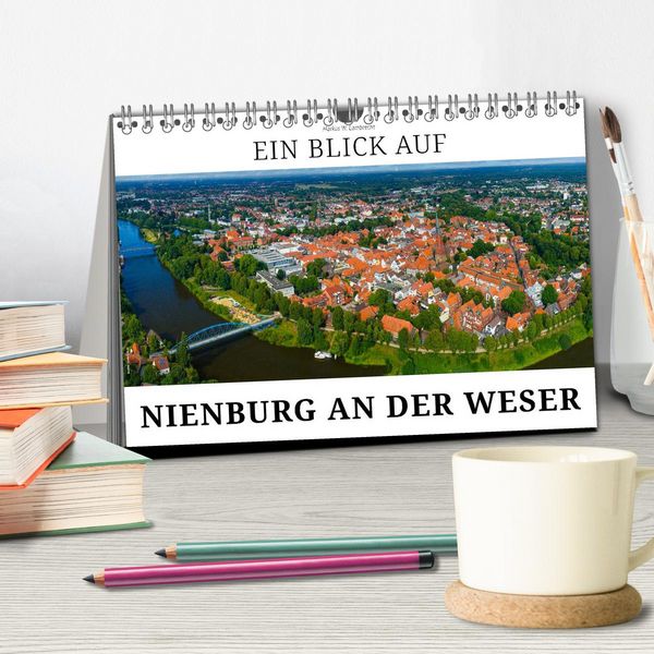 Produktbild: Ein Blick auf Nienburg an der Weser in Farbe (Tischkalender 2027 DIN A5 quer), CALVENDO Monatskalender