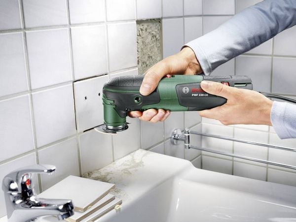 Produktbild: Bosch Home and Garden PMF 220 CE Set 0603102001 Multifunktionswerkzeug mit Zubeh&ouml;r, inkl. Koffer 16teilig 220 W