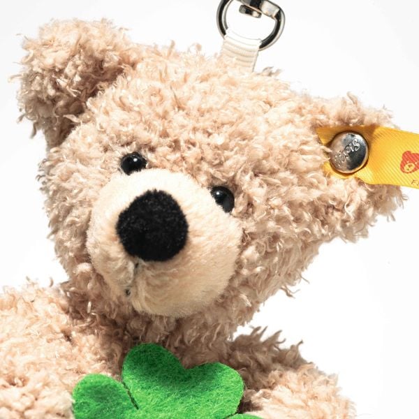 Produktbild: Steiff 112621 - Anh&auml;nger Fynn Teddyb&auml;r Good Luck, Teddy mit Kleeblatt, beige/gr&uuml;n, Pl&uuml;sch-Schl&uuml;sselanh&auml;nger, 12 cm