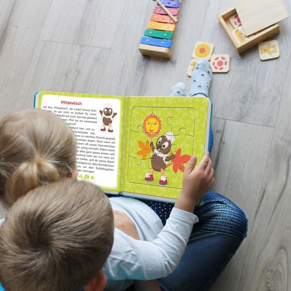 Produktbild: Tr&ouml;tsch Unser Sandm&auml;nnchen Puzzlebuch mit 4 Puzzle Sandmann