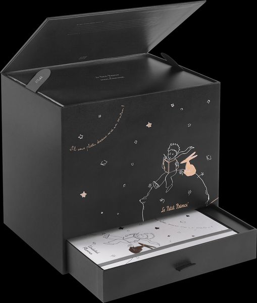 Produktbild: Moleskine der kleine Prinz Sammlerbox, liniertes Notizbuch L/A5 schwarz, undatierter 12-Monats-Notizkalender L/A5 fester Einband grau