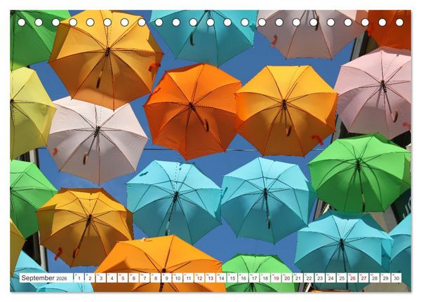 Produktbild: Umbrella Skies - Farbenfrohe Schirme (Tischkalender 2026 DIN A5 quer), CALVENDO Monatskalender