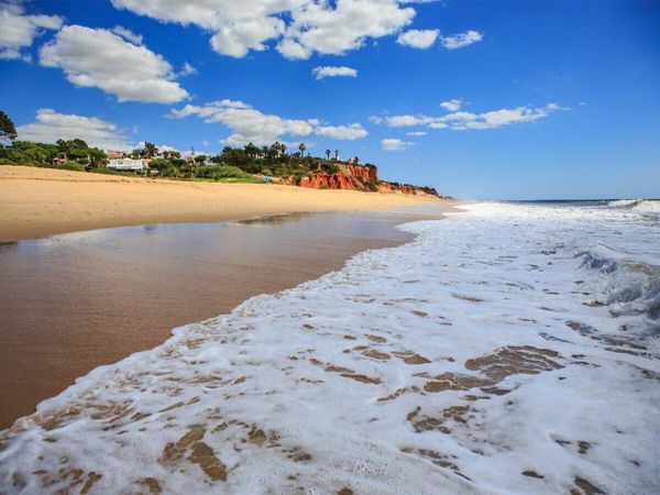 Produktbild: CALVENDO Puzzle Ein Strand an der Algarve in der N&auml;he von Quarteira | 1000 Teile Lege-Gr&ouml;&szlig;e 64x48cm Foto-Puzzle f&uuml;r gl&uuml;ckliche Stunden