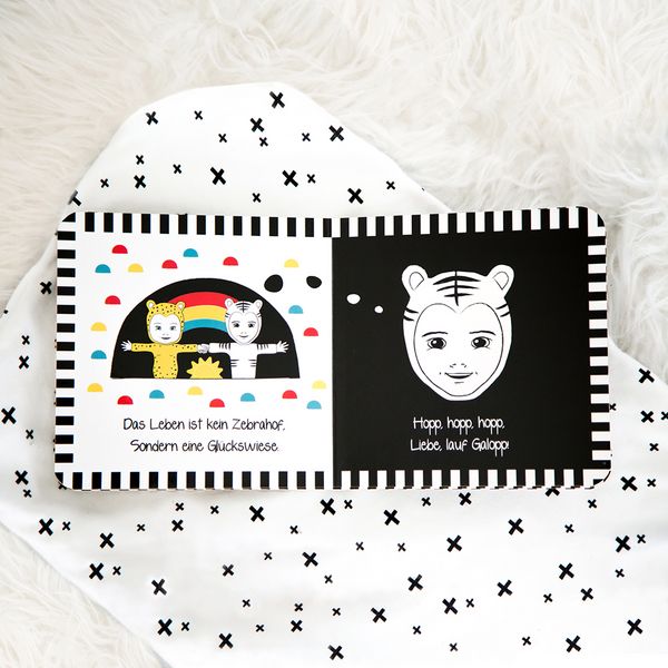 Produktbild: Papi &ndash; der wei&szlig;e Tiger: Kontrastbuch f&uuml;r Babys &ndash; Gesichter &middot; kontrastreiche Bilder angepasst an Babyaugen &middot; Schwarz Wei&szlig; Prim&auml;rfarben Buch f&uuml;r Neugeborene &middot; Mein erstes Bilderbuch &middot; Montessori Buch
