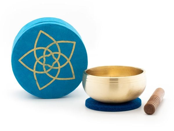 Gegossene Meditations-Klangschale mit hellerem Klang in einer farbenfrohen Geschenk-Box in Petrol aus handgeschöpftem nepalesischen Naturpapier mit