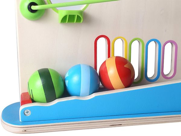 Produktbild: Bunte Holzkugeln, Gef&auml;lle, Tunnel und Rollbahnen auf beiden Seiten der Kugel-Rennbahn &ndash; das ist rasanter Spielspa&szlig;! Super f&uuml;r die Kleinsten, denn sie k&ouml;nnen mit den Augen den rollenden Kugeln folgen.