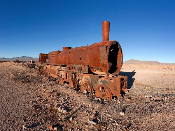 Produktbild: CALVENDO Puzzle Eisenbahnfriedhof bei Uyuni, 3.650 m &uuml;. N., Bolivien | 1000 Teile Lege-Gr&ouml;&szlig;e 64x48cm Foto-Puzzle f&uuml;r gl&uuml;ckliche Stunden